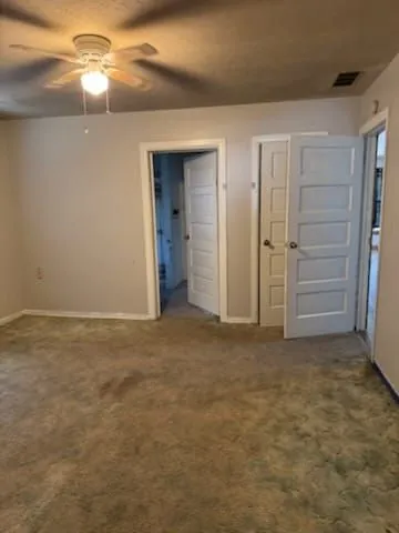 1614 Grandview Ave, Pawhuska, OK. Carpeted room, interior doorways